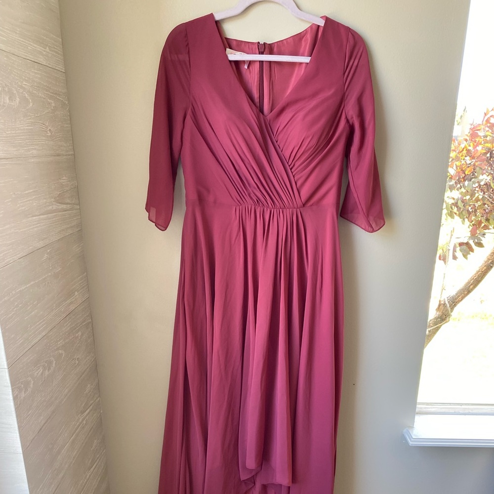 Special occasion pink dress.